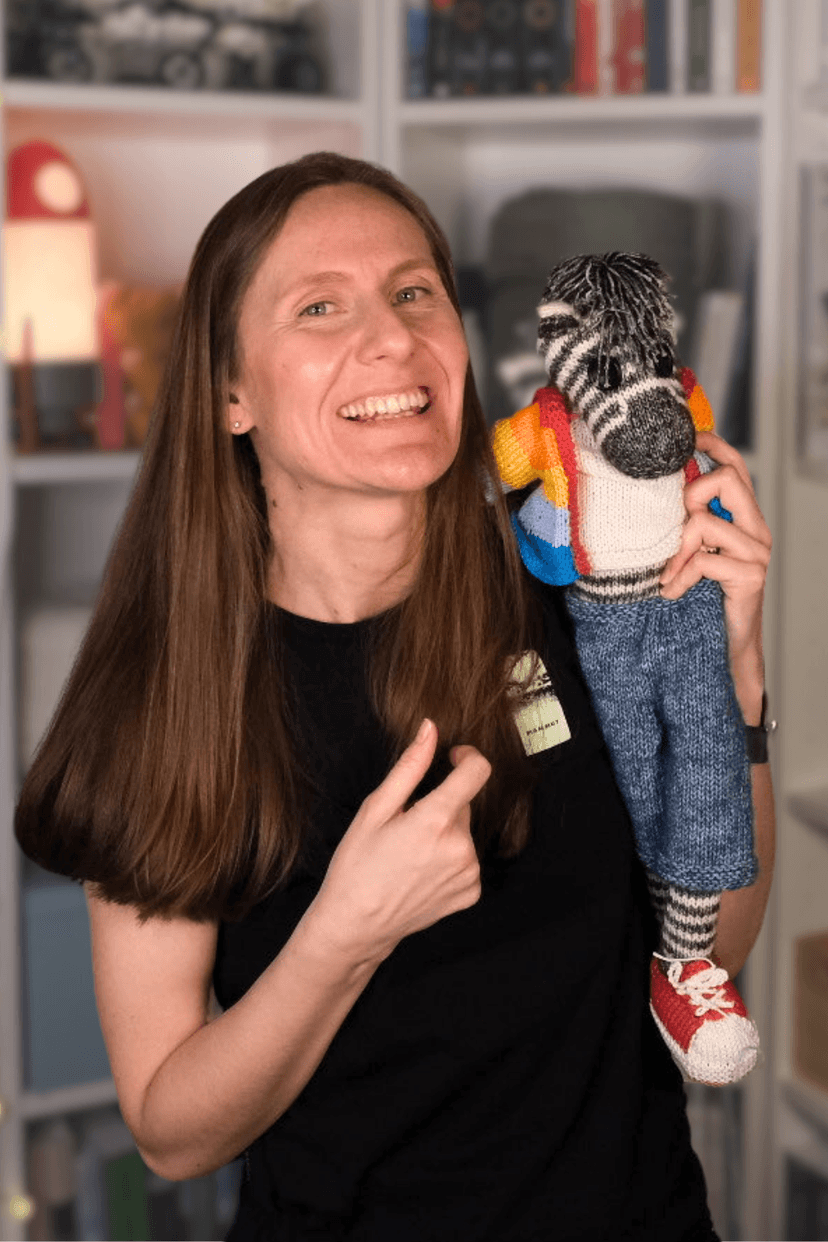 A photo of me with a knitted zebra - Hugo